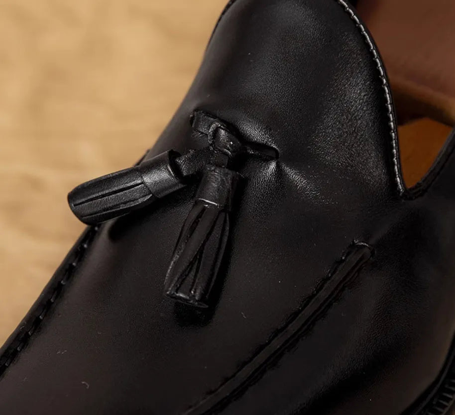 Men's genuine leather slip-on loafers with fringed detailing in black or brown