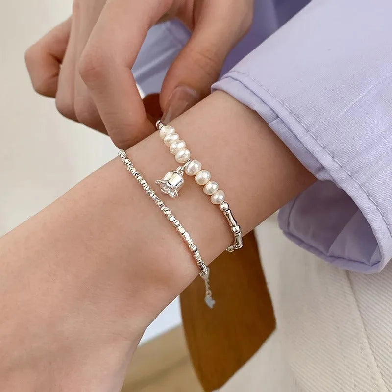 Silver pearl lily of the valley pendant bracelet on copper chain
