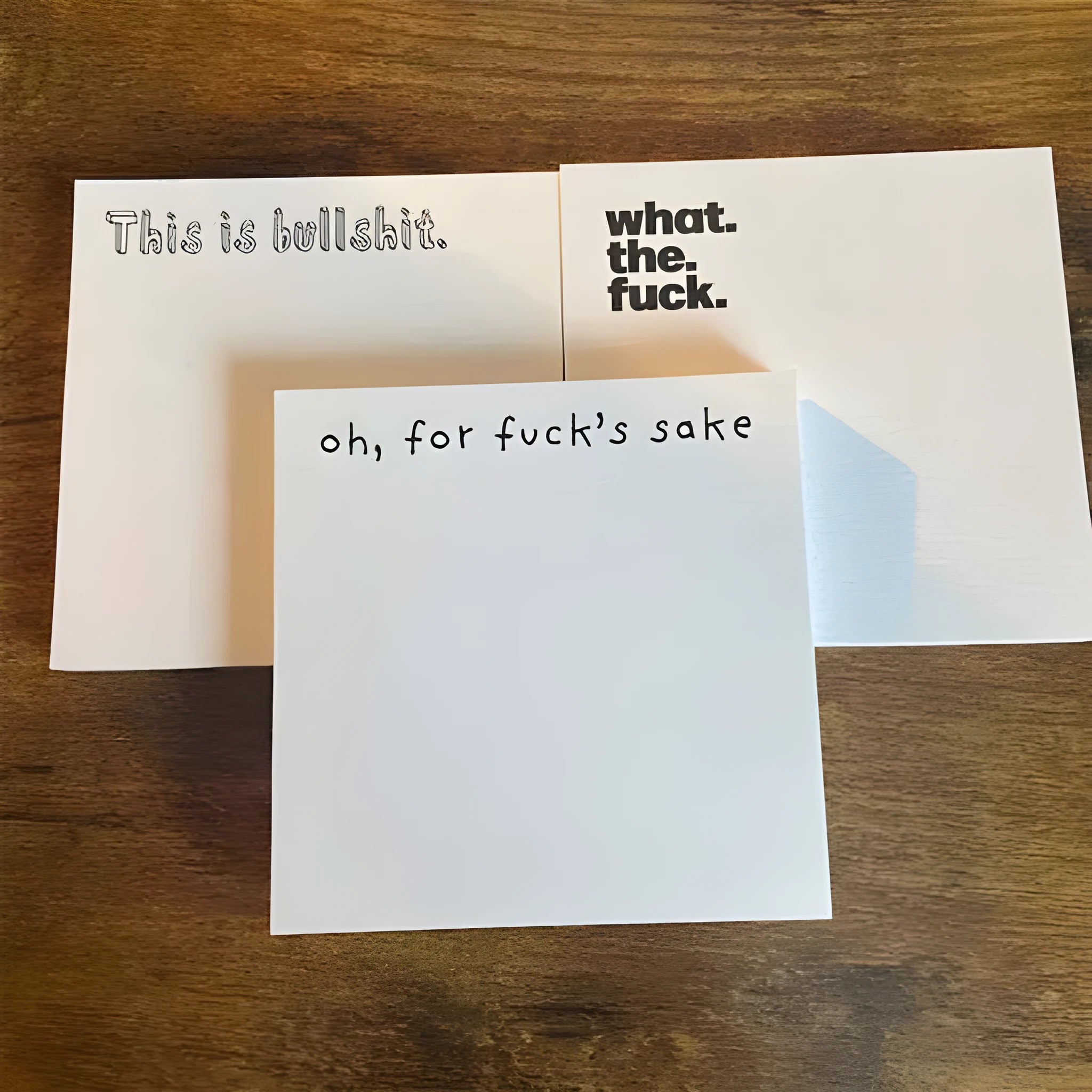 Small square sticky notes measuring 7.5cm with printed English phrases and adhesive back.
