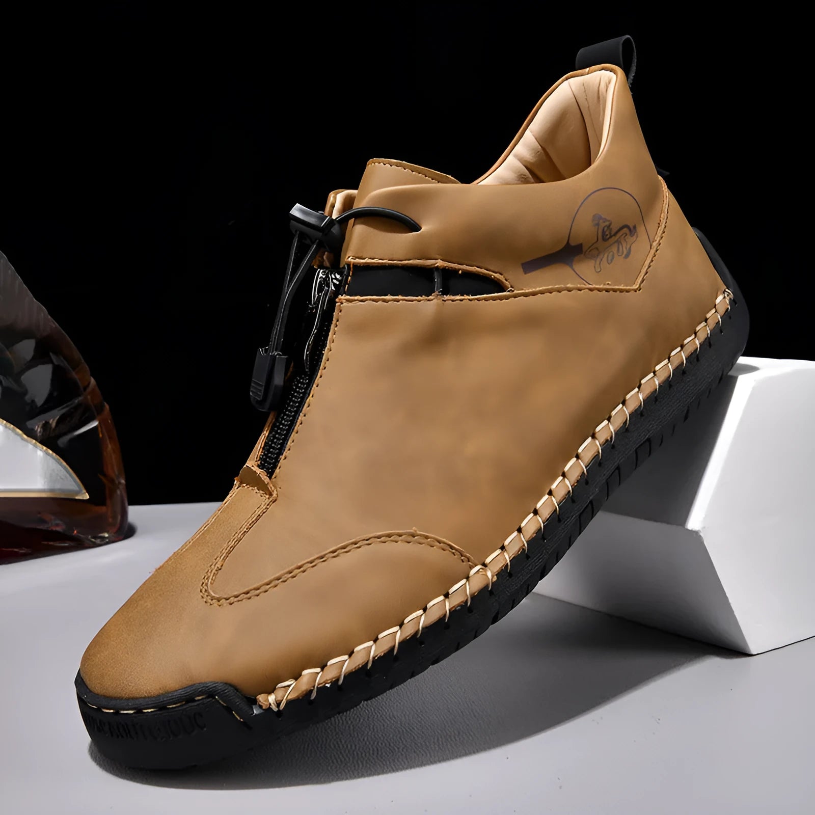 Men's black casual leather shoes with a mid heel and round toe on a rubber sole