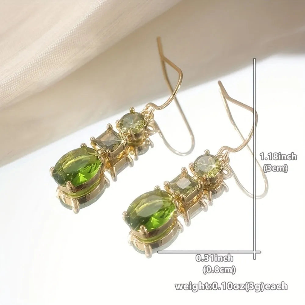 A pair of green copper geometric earrings with a quadrilateral shape and retro bohemian style.