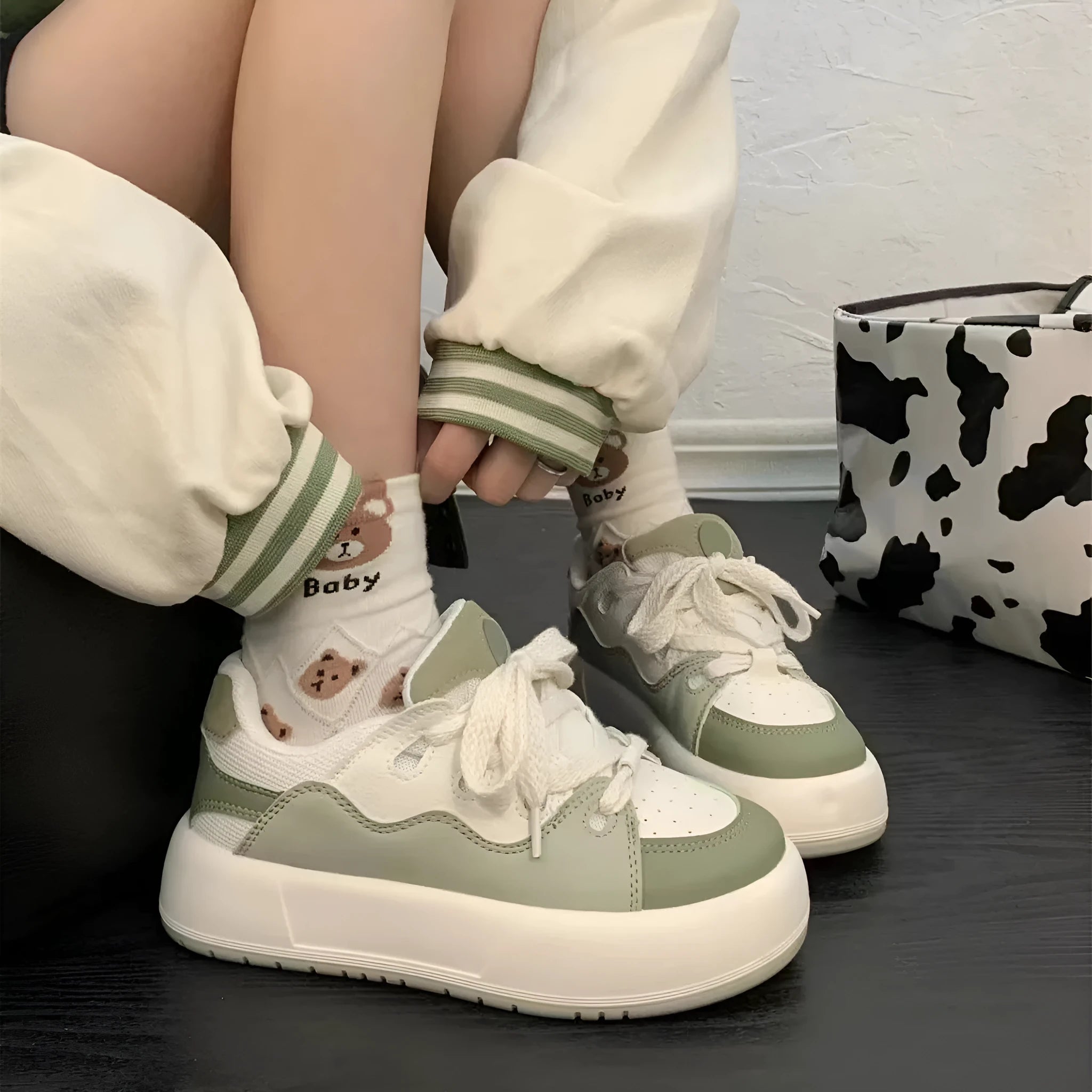 Green women's casual flat shoes with mesh material and round toe design