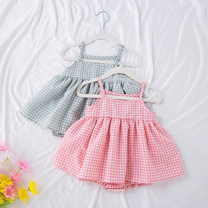 Baby sling romper dress in plaid pattern, princess style, polyester, available in pink or light green, sizes 68-86