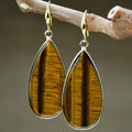 Handmade vintage long water drop earrings in Tigereye stone with textured details