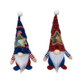 Two faceless baby doll Christmas decorations in suit costumes with Rudolf sack design