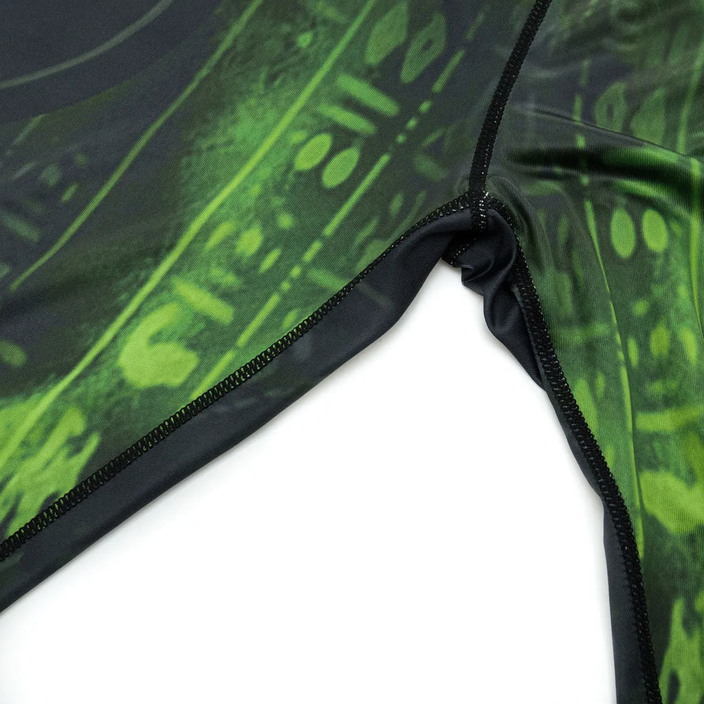Men's slim-fit printed sports suit with long sleeves, showing top and trousers