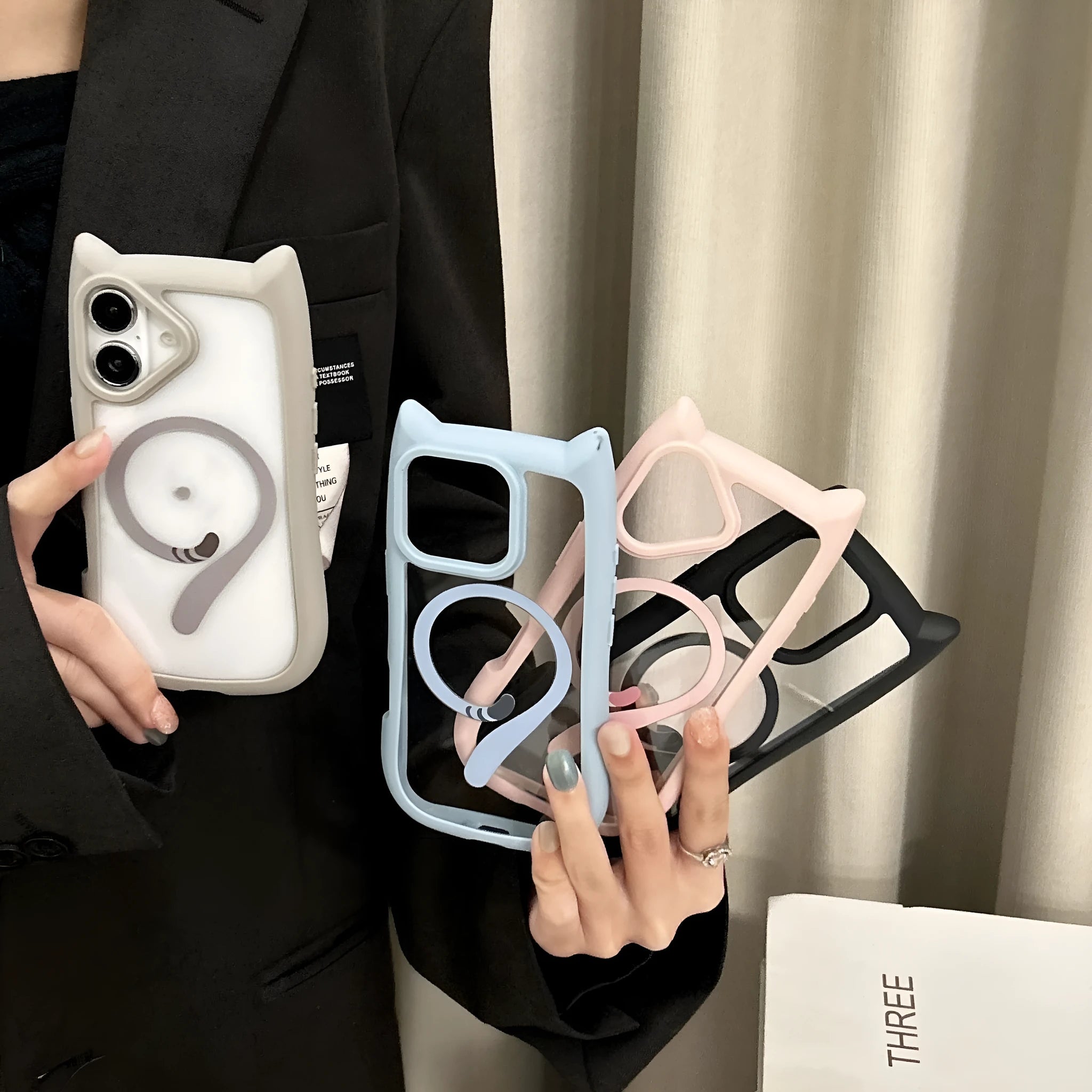 Transparent acrylic TPU phone case for IPhone 17 with magnetic suction, shown in black, blue, grey, and pink colours.