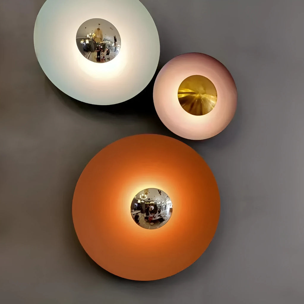 Circular UFO wall lamp in iron construction available in multiple sizes and colours