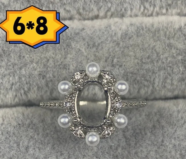 Oval denier copper ring with 6x8mm stone, star detail, and open-mouth band in Korean style.