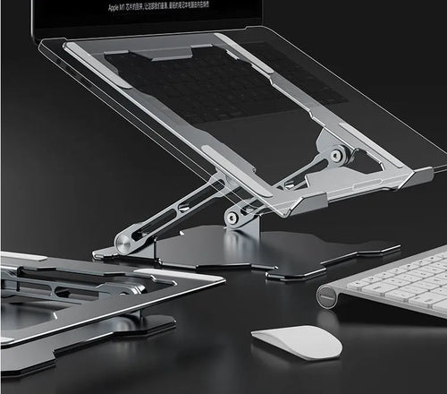 Grey adjustable aluminium laptop stand in open and folded positions on a wooden desk.