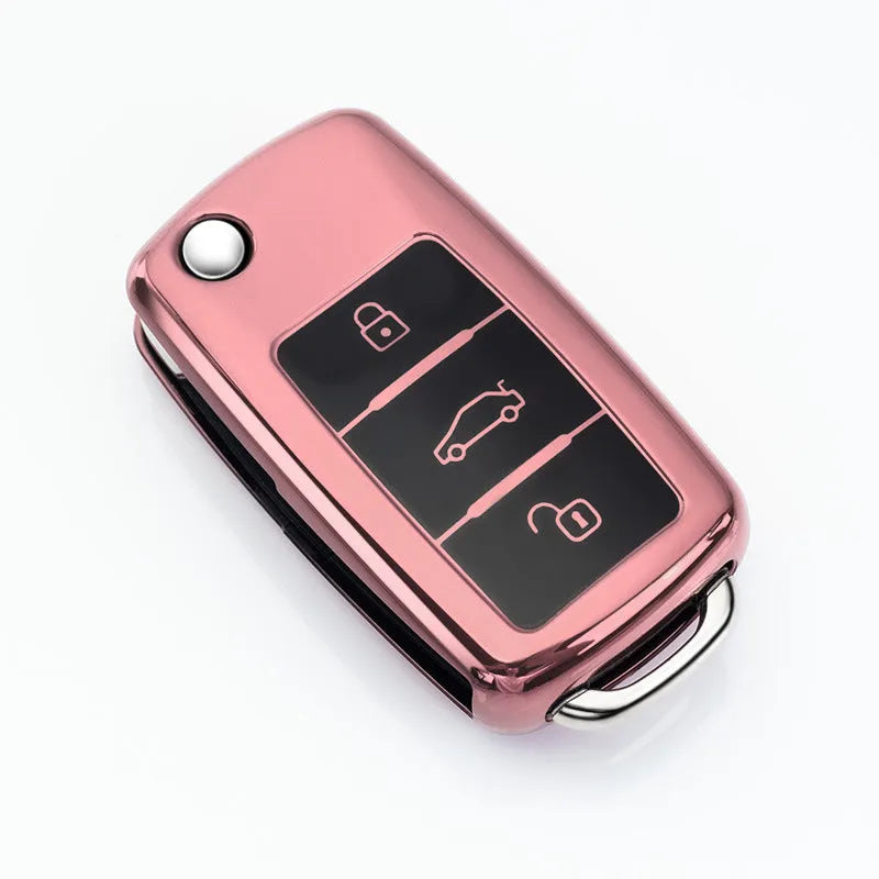 VW Model A car key case in four colours: blue, pink, red, and silver with buckle attachment