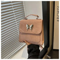 Women's preppy style PU backpack with hand-carry handle showing bow decoration and six colour options