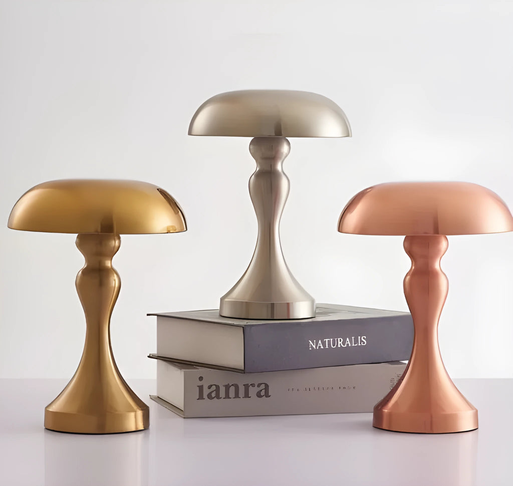 Metallic USB rechargeable LED desk lamp with touch control showing bronze, gold, and silver colour options.