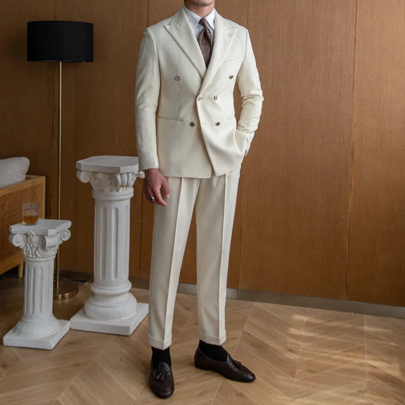 Men's slim double breasted suit set in off-white with two-button front and long sleeves, shown on hanger