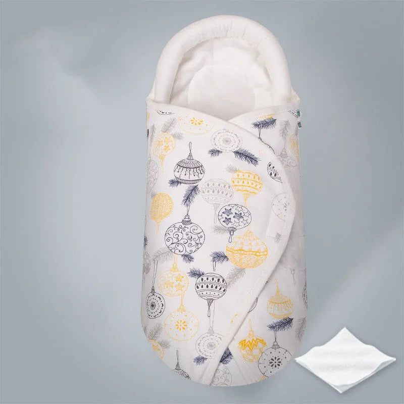 Cotton anti-startle swaddle blanket for babies in a colourful dinosaur print, 30 by 60 cm.