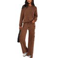 Women's long sleeve polyester leisure sports suit with trousers in multiple colour options.