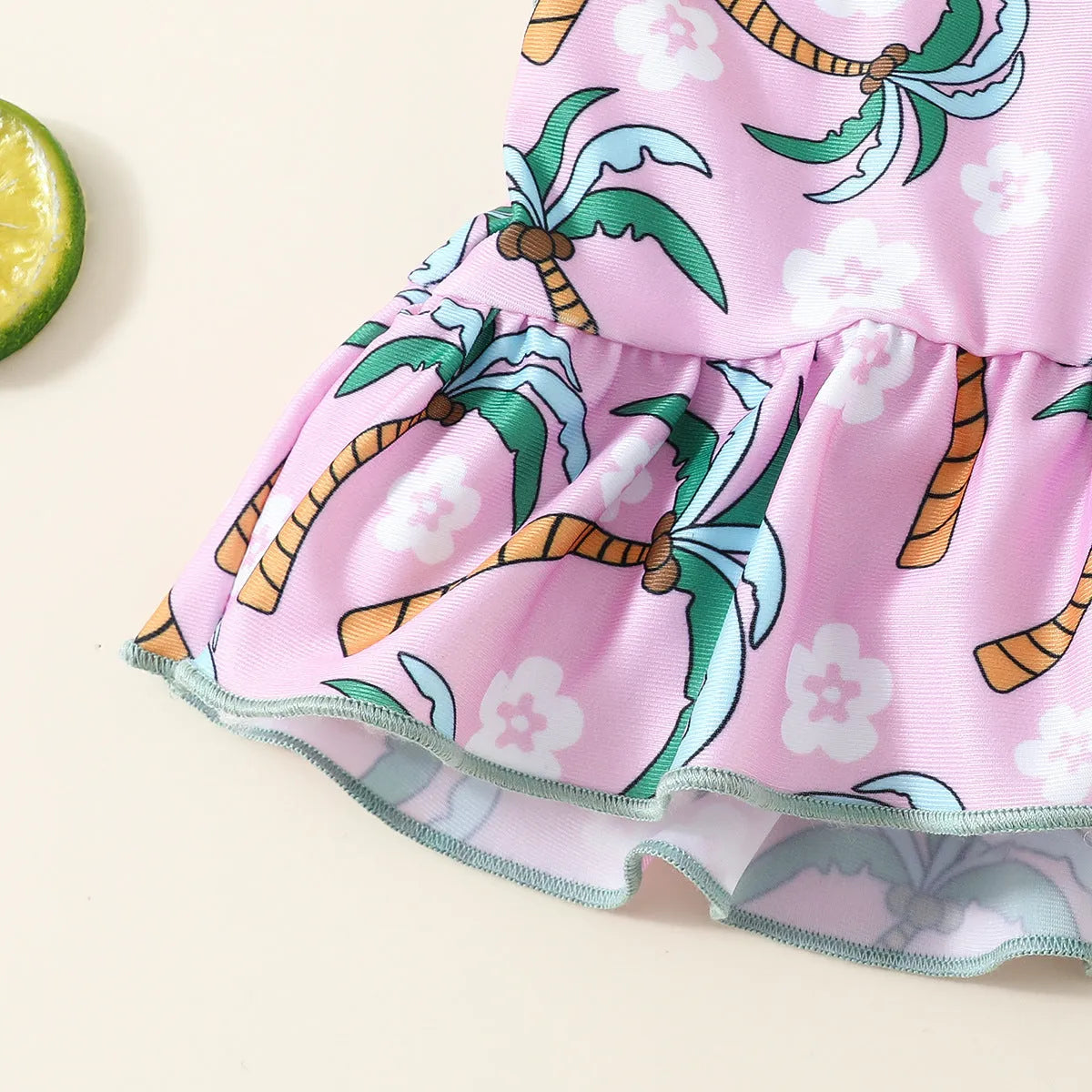 White children's two-piece swimsuit set with shirt and beach shorts for toddlers.