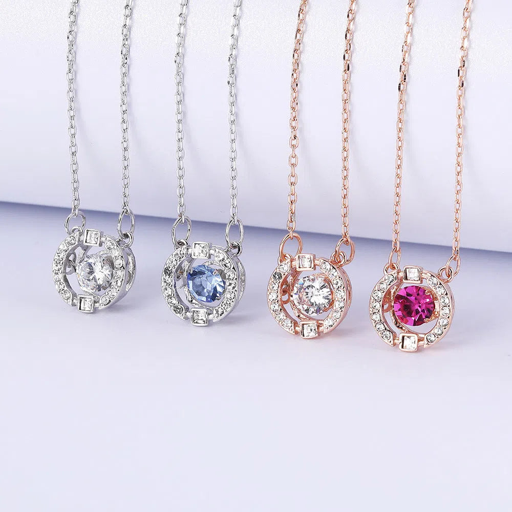 Colorful and lively geometric crown necklace pendant in copper with rhinestone details and cross chain