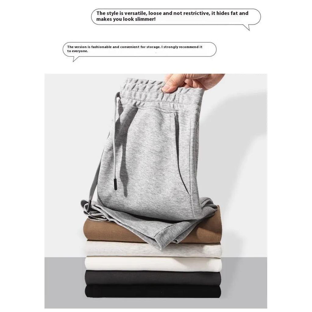 Men's straight-cut cotton summer shorts in light grey, showing fifth-pant length and casual style.
