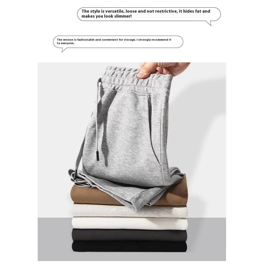 Men's straight-cut cotton summer shorts in light grey, showing fifth-pant length and casual style.