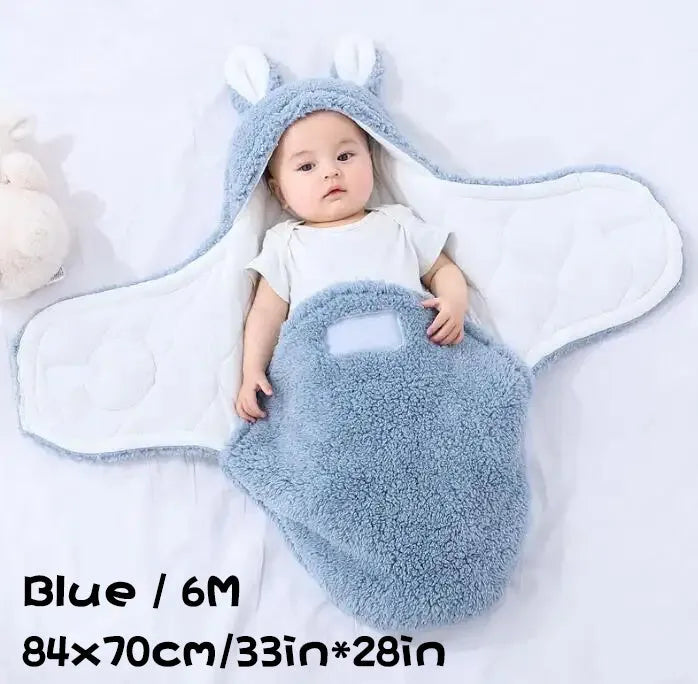 Adjustable baby sleeping bag swaddle blanket showing velcro wings and leg positioner in blue colour