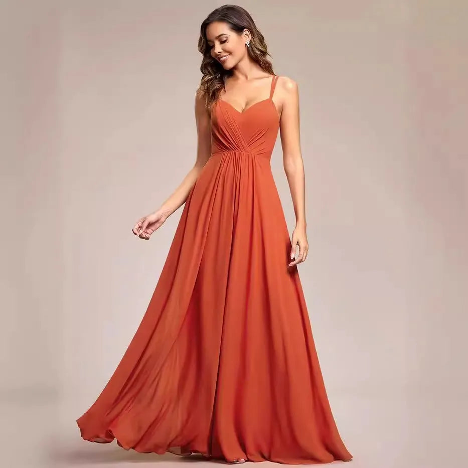 Women's long pleated A-line dress with sleeveless sling neckline in solid colours