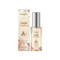 Hair Thicker Oil 50ml bottle with rosemary and coconut extracts on a wooden surface