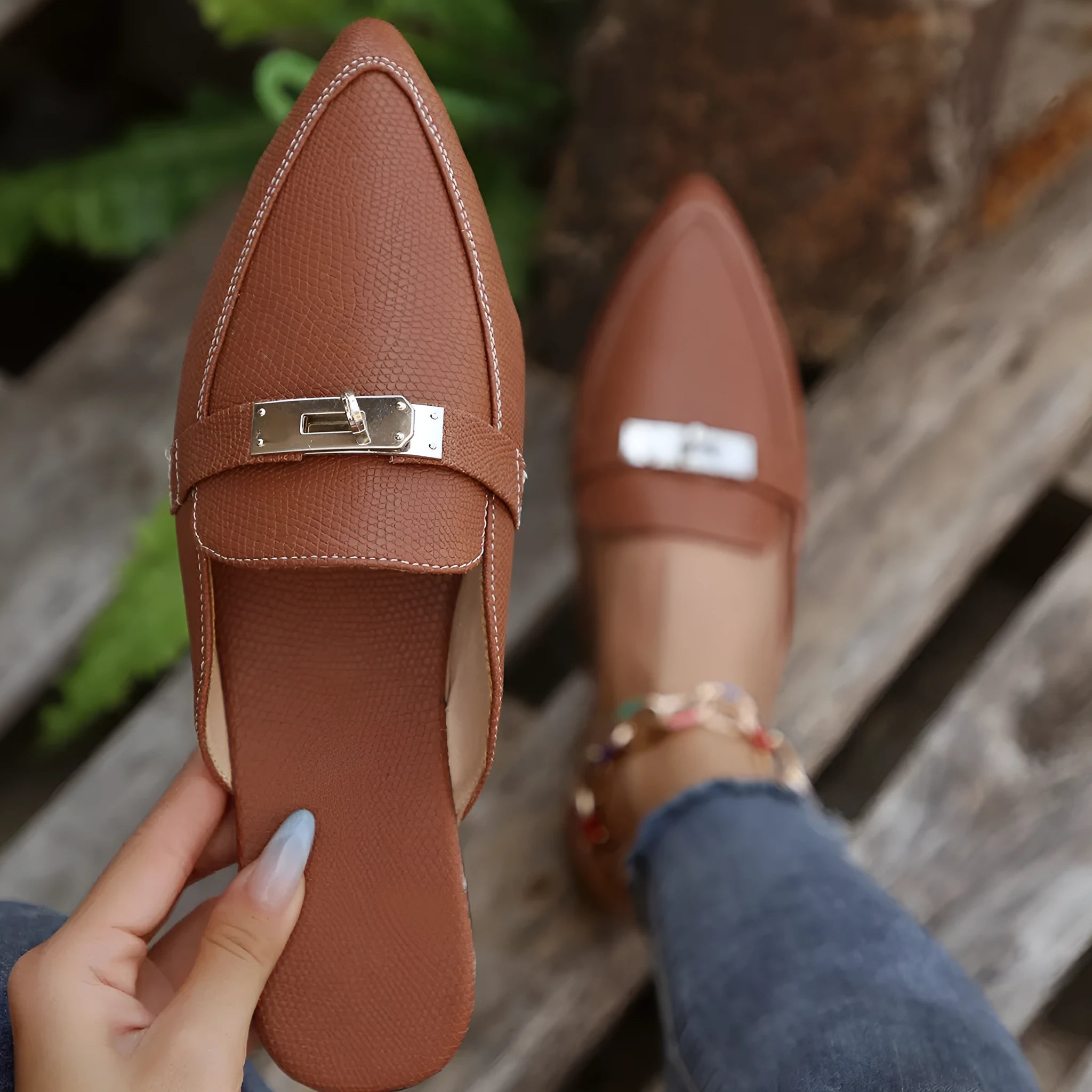 Light brown women's pointed-toe low heel semi-slippers with a PU upper and rubber sole.