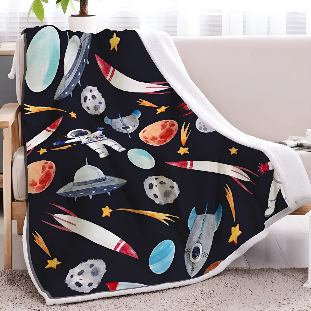 Black astronaut themed lamb wool blanket with soft sherpa fleece and hemmed edges, available in 130x150cm or 150x200cm.