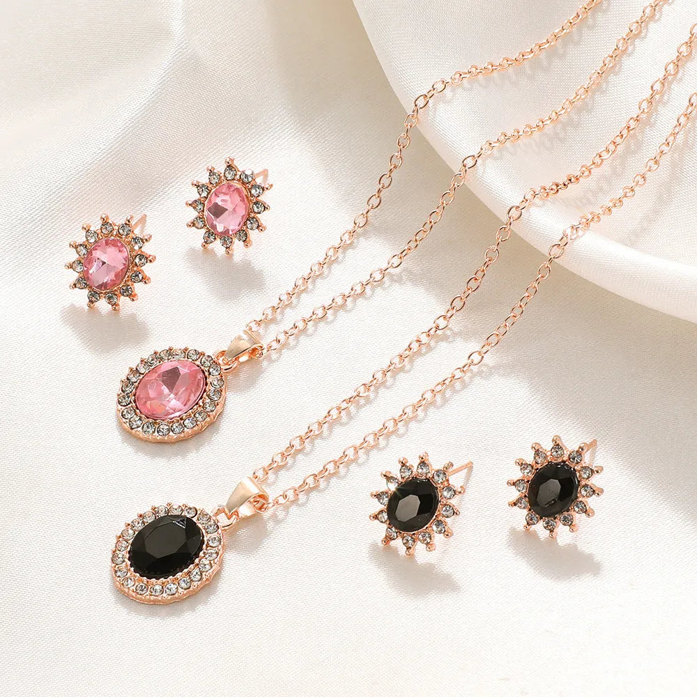 Rose gold sunflower earrings and necklace set for women on white background