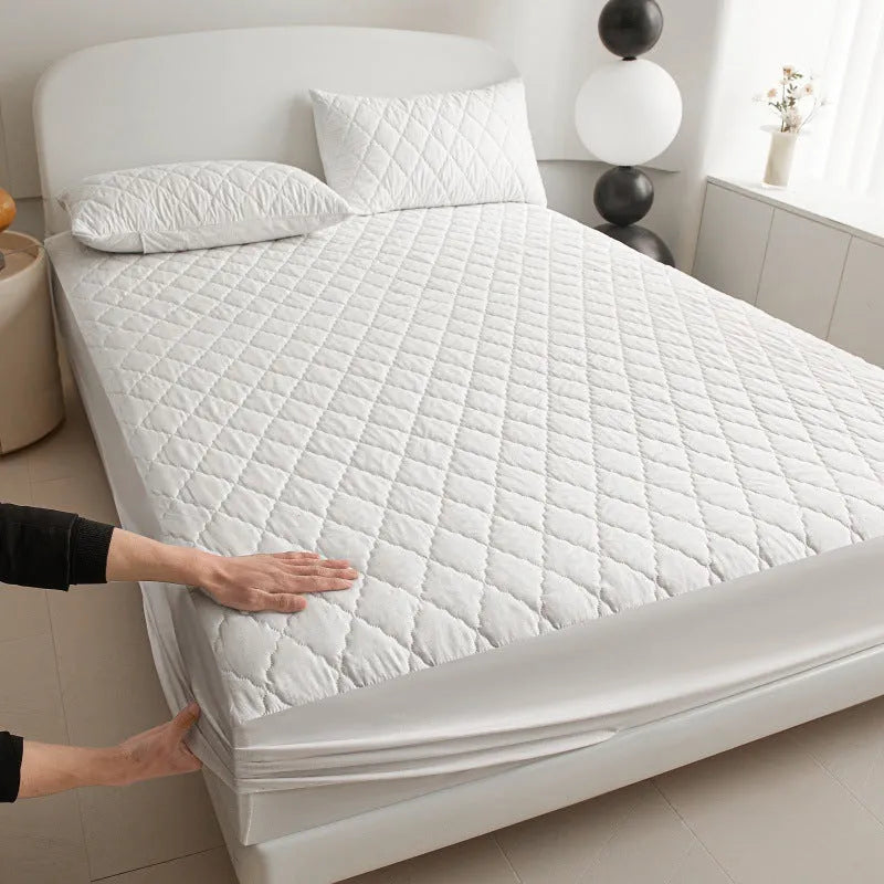 Diamond quilted bamboo fibre waterproof mattress protector fitted sheet and pillowcases set.