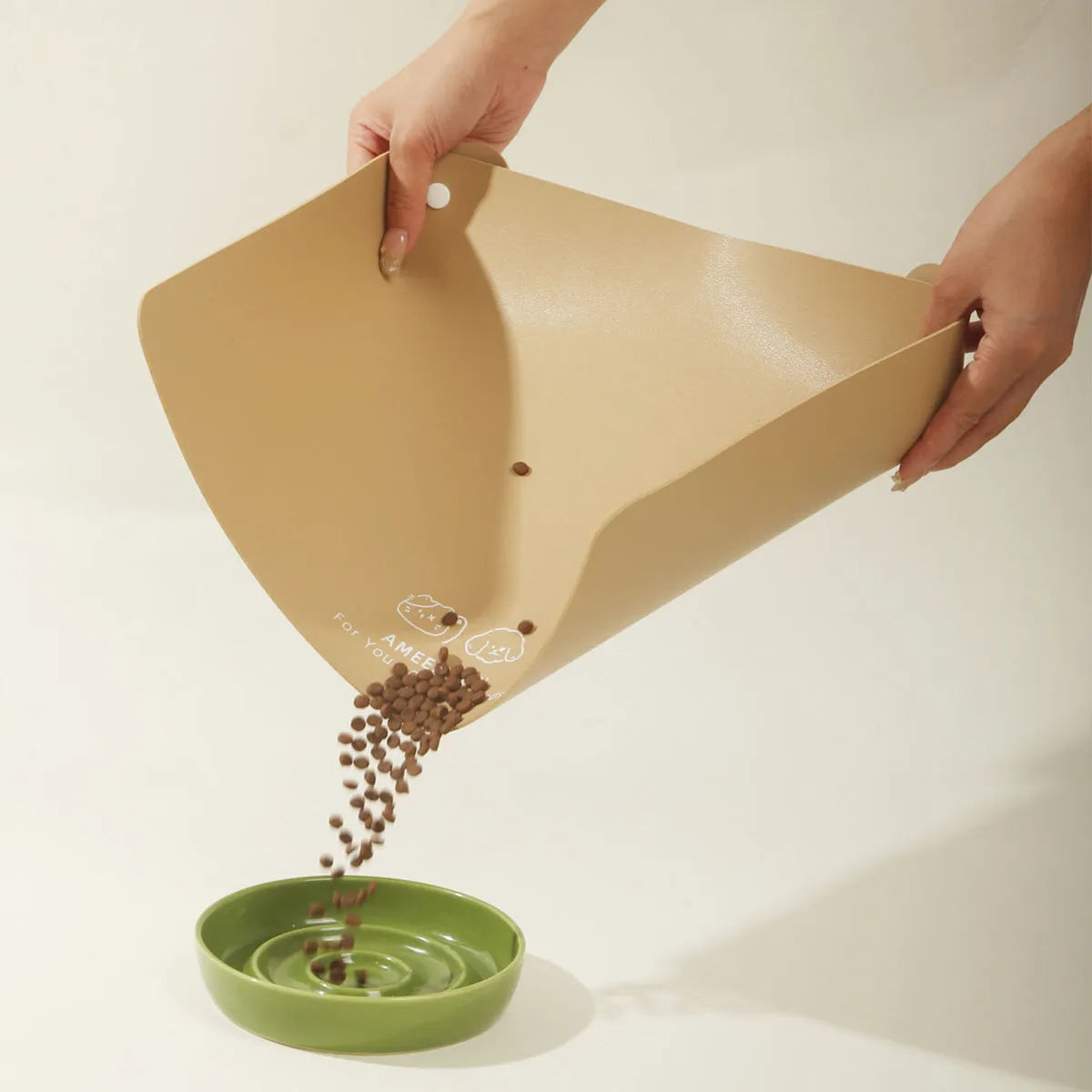 Anti-spill waterproof leather pet placemat in apricot colour under dog bowl