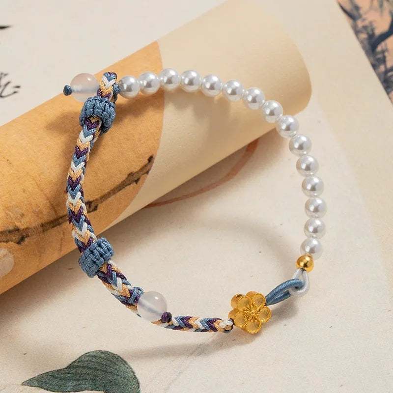 Peach-coloured carrying strap bracelet with Chinese flower weaving pattern featuring sterling silver and chalcedony beads
