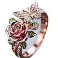 Adjustable fairy style butterfly ring with colourful oil droplet finish and rose leaf insect design