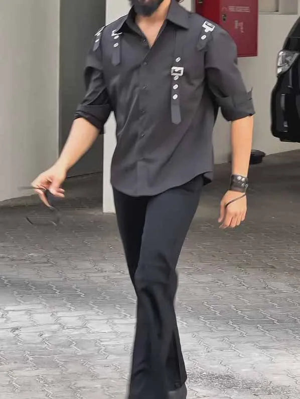 Men's black polyester button-up shirt with regular fit on a mannequin.