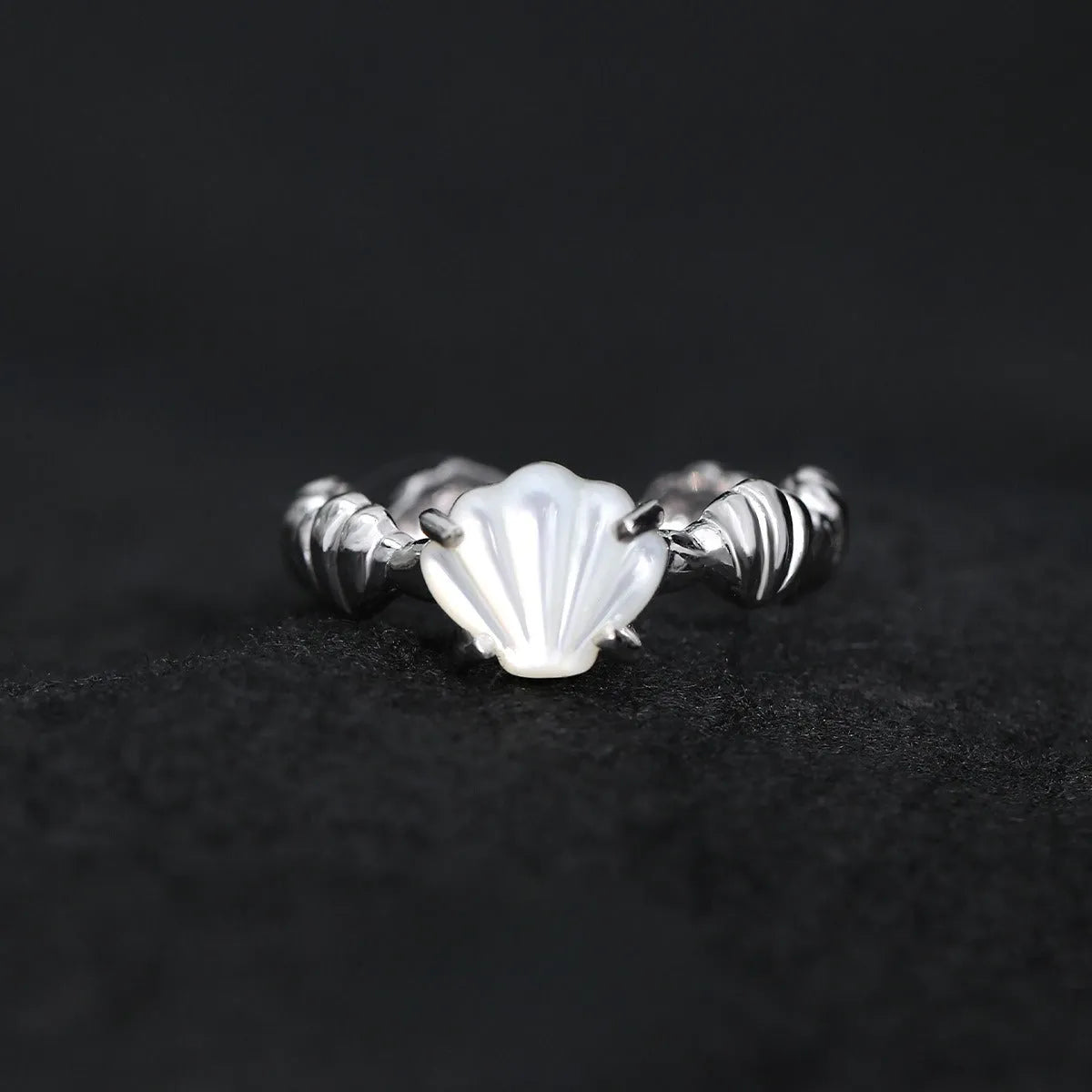 Adjustable silver ring with shell design and tiger eye gemstone in gold electroplated finish