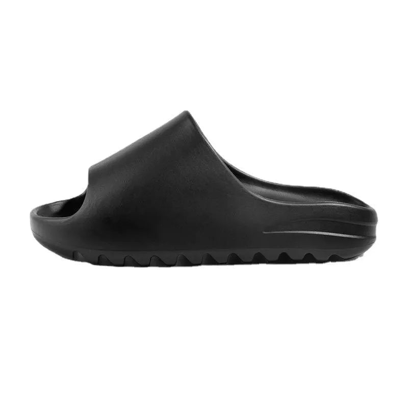 Women's thick-soled beach slippers in beige, black, brown, and green on a summer background.