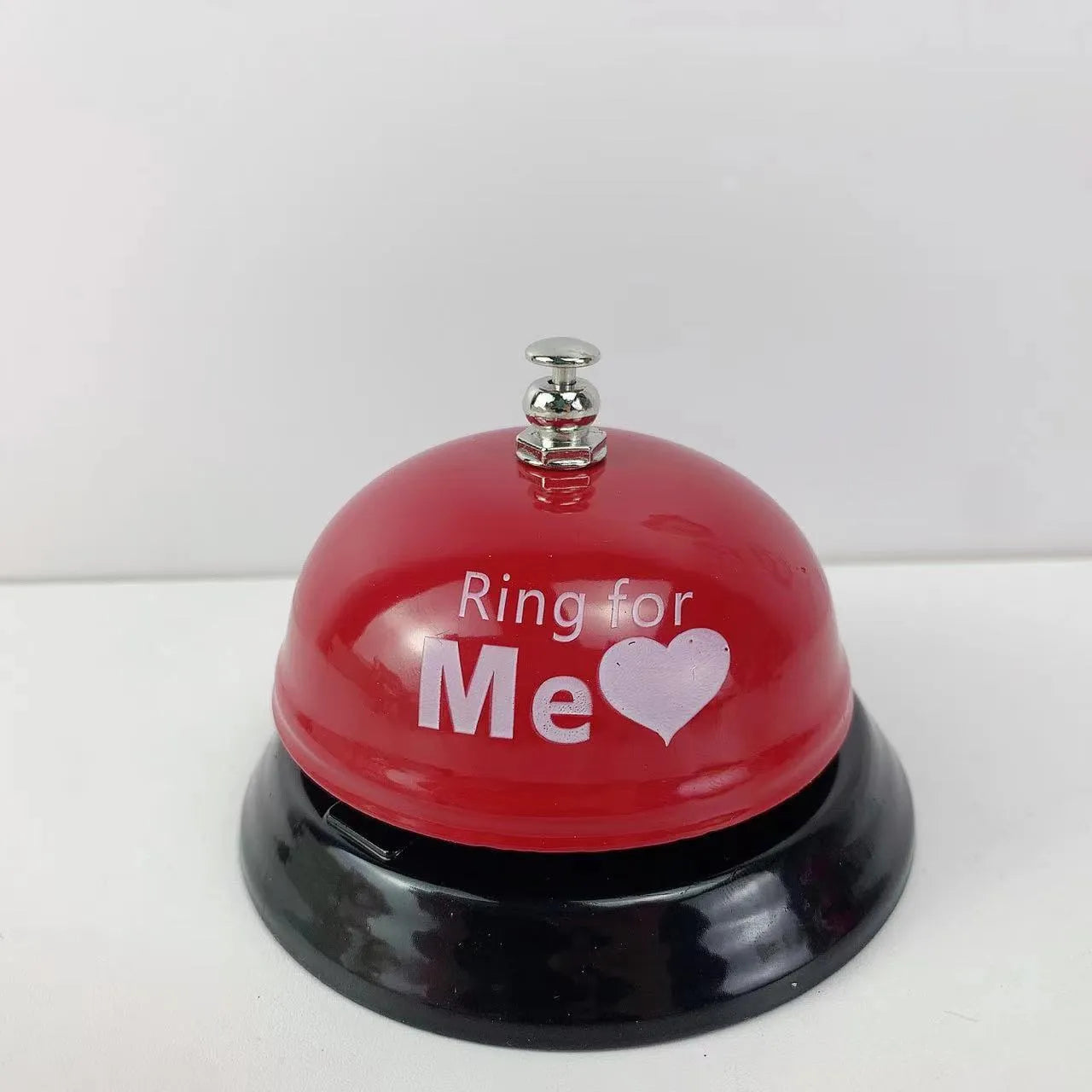 Iron handheld bell in selected colour for classroom games or restaurant service.
