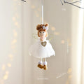 White Christmas tree hanging ornament with mesh angel girl design, snowflake styling, and metal, plastic, and cloth construction.
