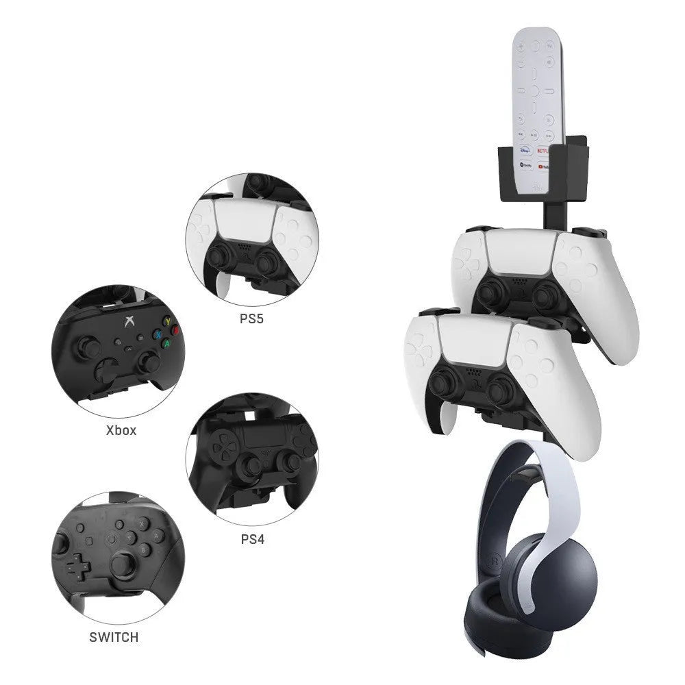 White wall-mounted plastic hook holding a game controller and a gaming headset.