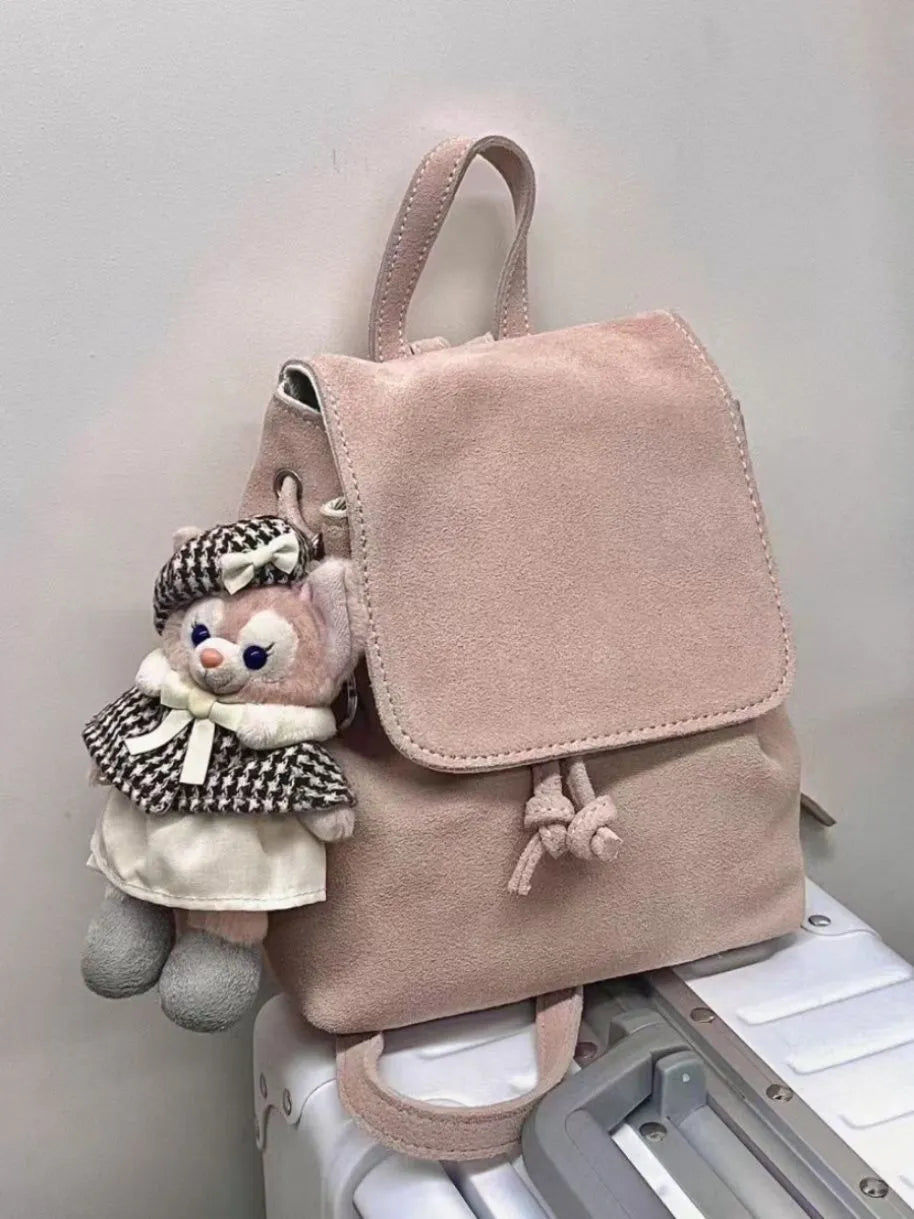 Retro suede girls backpack in brown or pink with polyester outer and suede leather lining