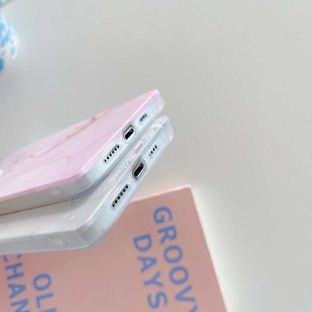 Square gilt marble iPhone case in TPU and silicone with straight edge and IMD print, shown in marble colourways