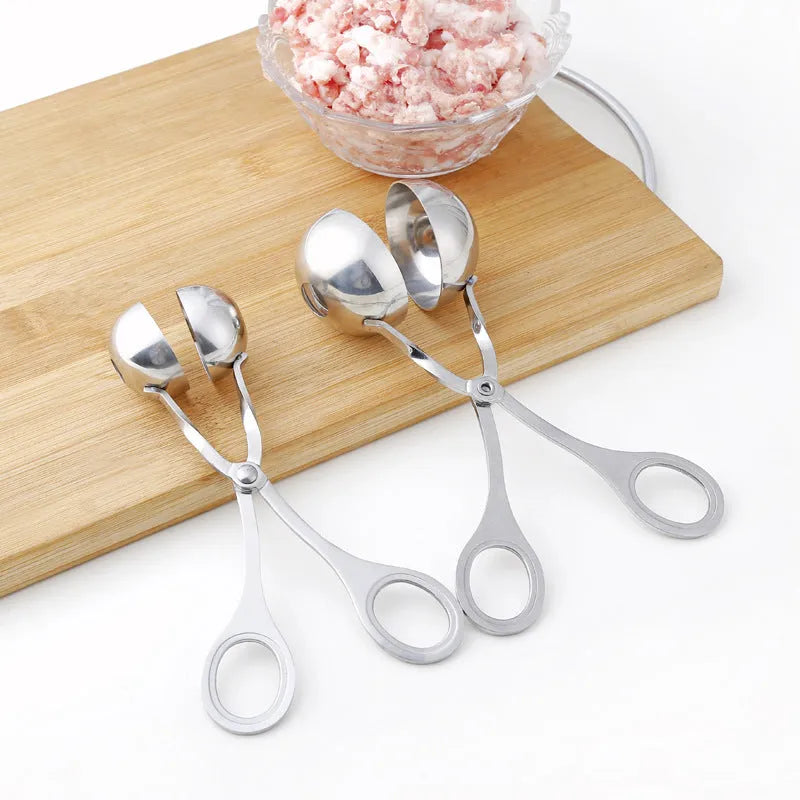 304 stainless steel meatball maker tongs on plain background, shows clip design and two size options, 16.5 cm length