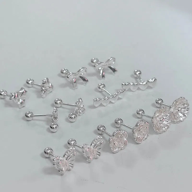 999 pure silver ear studs with butterfly design and tightening buckle in E9949 colour