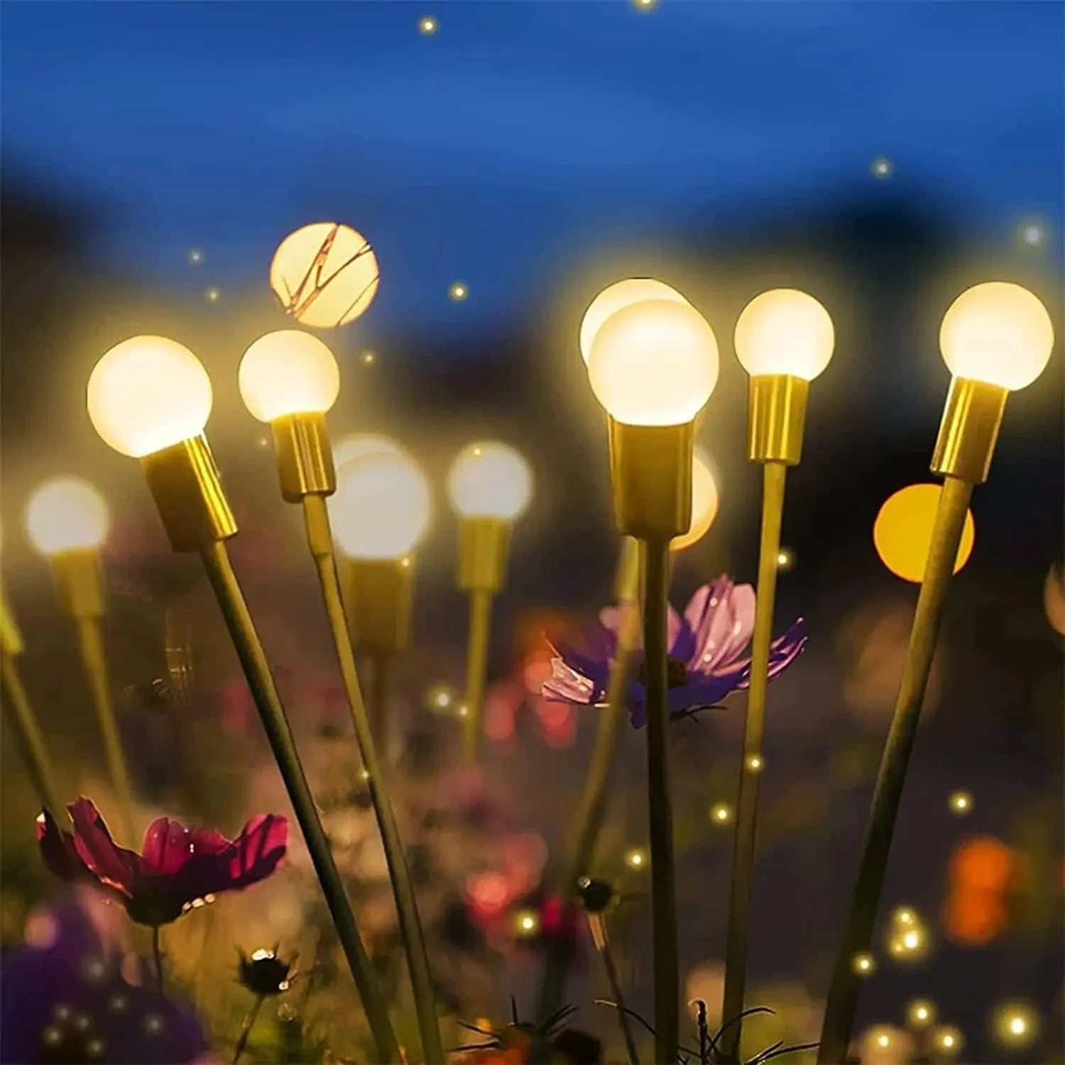 Solar powered LED ground spike garden light with multiple warm white and colour LED heads on stainless steel stake.
