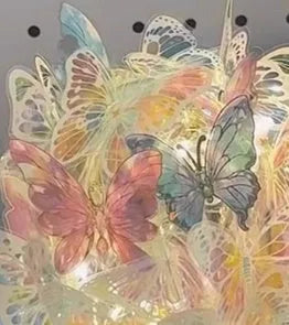 Butterfly design night light with glass shade on raw wood base, battery operated bedroom lamp