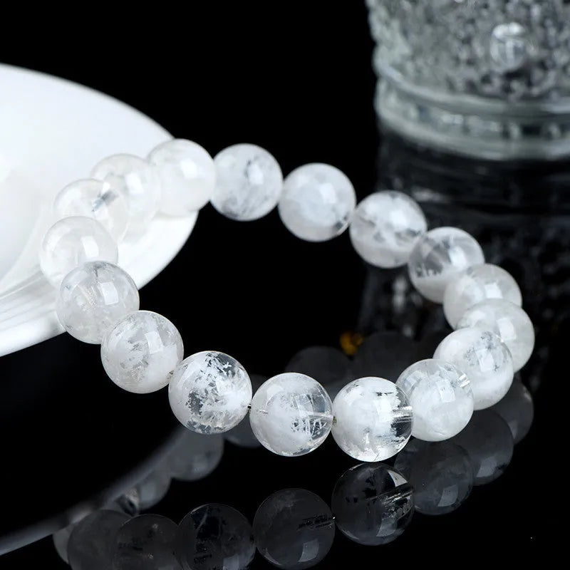 Women's crystal bracelet with geometric design featuring blizzard snowflake beads and traditional Ruyi Xiangyun motifs