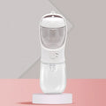 Blue portable dog water cup showing the two-in-one dispenser and bowl design for outdoor use.
