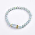 Natural Myanmar jade round bead bracelet with emerald green colour geometric stones