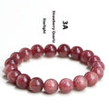 Strawberry quartz crystal bracelet with cherry red starlight colour and geometric beads